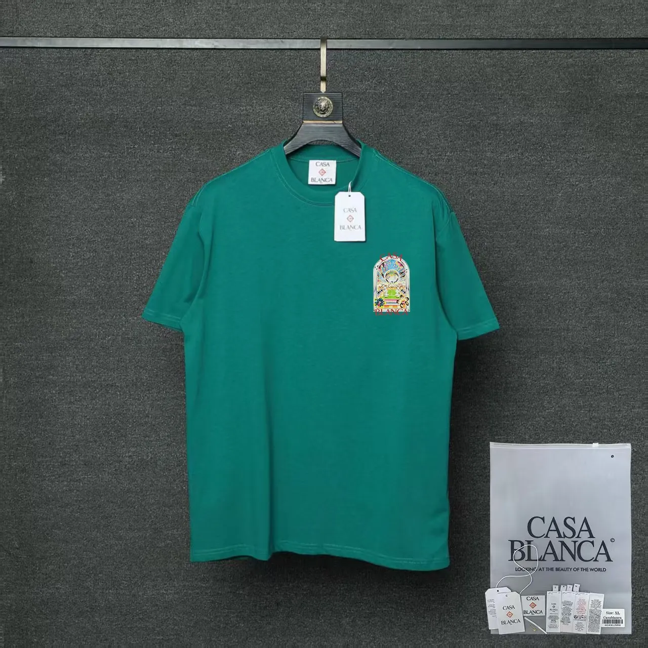 26ss CASABLANCA original printing process short-sleeved T-shirt original development using high-density double yarn pure cotton fabric upper body soft and comfortable color Black White Dark Green color Orange Pink Blue Royal Blue color cigarette powder 8 colors Sizes S M L XL